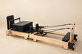 Movalia Sylva — Reformer Pilates pliable en bois d'érable